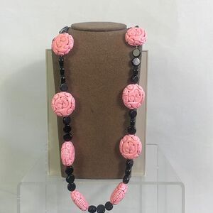 Carved Pink Stones and Black Necklace